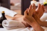 133688228 - Massage of human foot in spa salon - Soft focus